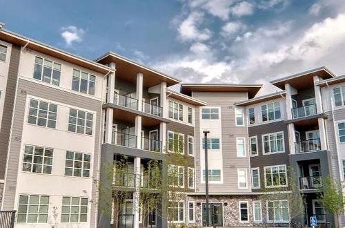 2210-681 Savanna Boulevard Ne, Calgary, AB - Outdoor With Balcony With Facade