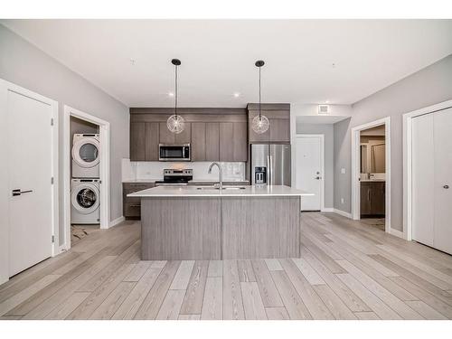 2210-681 Savanna Boulevard Ne, Calgary, AB - Indoor Photo Showing Kitchen