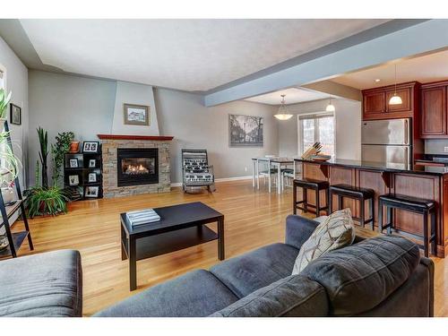 124 Haverhill Road Sw, Calgary, AB - Indoor Photo Showing Living Room With Fireplace