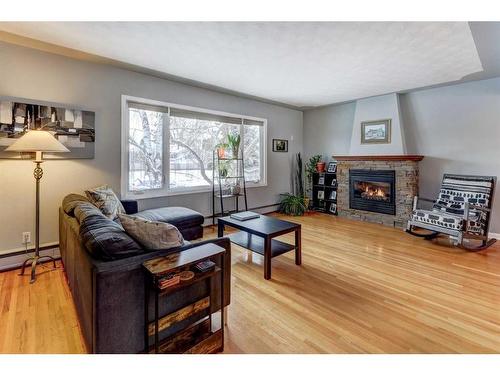 124 Haverhill Road Sw, Calgary, AB - Indoor Photo Showing Living Room With Fireplace