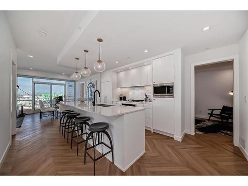 317-8505 Broadcast Avenue Sw, Calgary, AB - Indoor Photo Showing Kitchen With Upgraded Kitchen