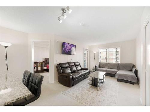 3408-4641 128 Avenue Ne, Calgary, AB - Indoor Photo Showing Living Room