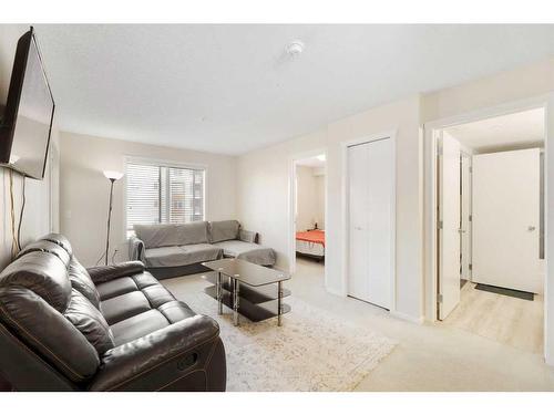 3408-4641 128 Avenue Ne, Calgary, AB - Indoor Photo Showing Living Room