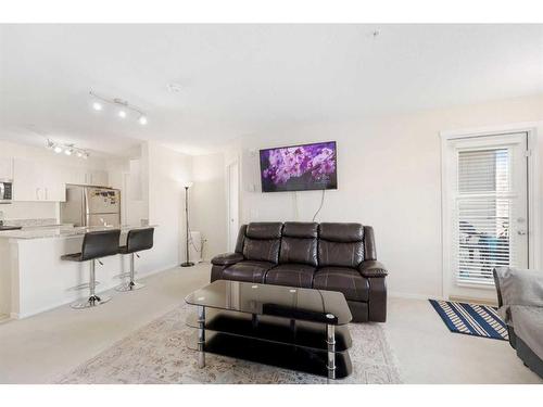 3408-4641 128 Avenue Ne, Calgary, AB - Indoor Photo Showing Living Room