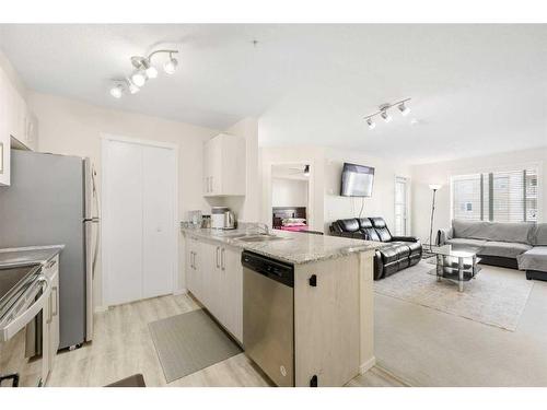 3408-4641 128 Avenue Ne, Calgary, AB - Indoor Photo Showing Kitchen With Double Sink