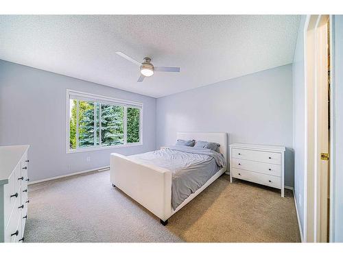 216 Cougar Ridge Drive Sw, Calgary, AB - Indoor Photo Showing Bedroom