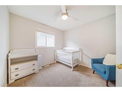 216 Cougar Ridge Drive Sw, Calgary, AB - Indoor Photo Showing Bedroom