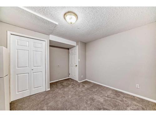 24 Whitaker Close Ne, Calgary, AB - Indoor Photo Showing Other Room