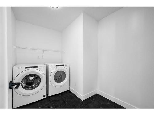 216 Crimson Ridge Place Nw, Calgary, AB - Indoor Photo Showing Laundry Room