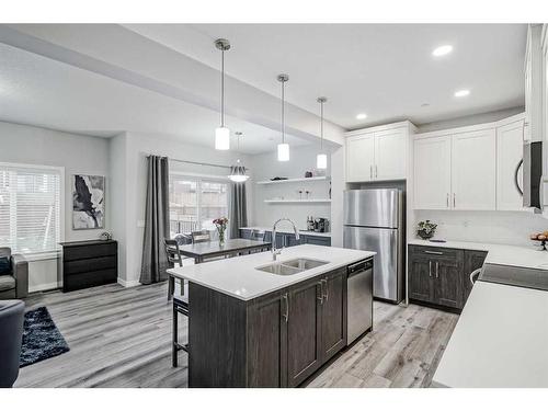 217 Lucas Crescent Nw, Calgary, AB - Indoor Photo Showing Kitchen With Stainless Steel Kitchen With Double Sink With Upgraded Kitchen