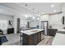 217 Lucas Crescent Nw, Calgary, AB  - Indoor Photo Showing Kitchen With Stainless Steel Kitchen With Double Sink With Upgraded Kitchen 