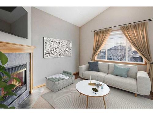 106 Royal Birch Gardens Nw, Calgary, AB - Indoor Photo Showing Living Room With Fireplace