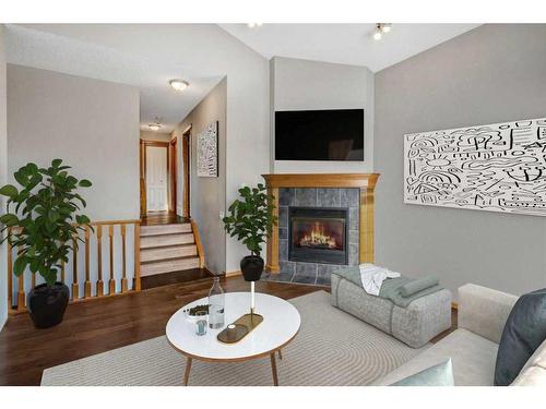 106 Royal Birch Gardens Nw, Calgary, AB - Indoor Photo Showing Living Room With Fireplace