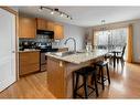 106 Royal Birch Gardens Nw, Calgary, AB  - Indoor Photo Showing Kitchen With Double Sink 