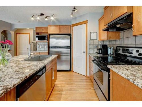 106 Royal Birch Gardens Nw, Calgary, AB - Indoor Photo Showing Kitchen With Stainless Steel Kitchen