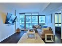 408-235 9A Street Nw, Calgary, AB  - Indoor Photo Showing Living Room 