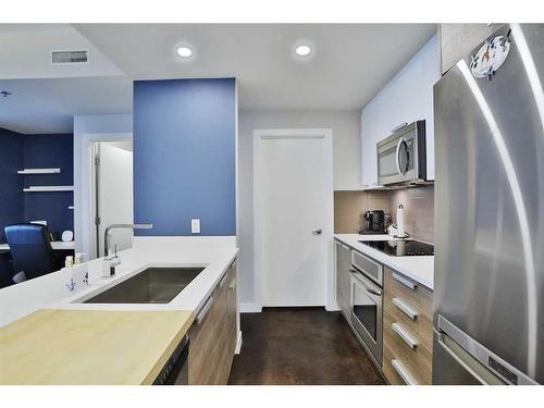 408-235 9A Street Nw, Calgary, AB - Indoor Photo Showing Kitchen With Stainless Steel Kitchen