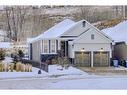 256 Cranbrook Drive Se, Calgary, AB  - Outdoor With Facade 