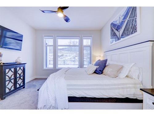 256 Cranbrook Drive Se, Calgary, AB - Indoor Photo Showing Bedroom