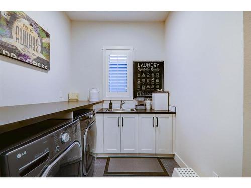 256 Cranbrook Drive Se, Calgary, AB - Indoor Photo Showing Laundry Room