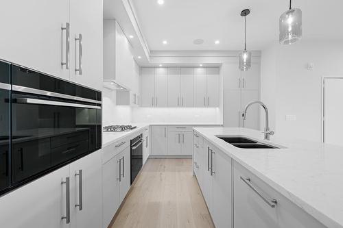 109-835 78 Street Sw, Calgary, AB - Indoor Photo Showing Kitchen With Double Sink With Upgraded Kitchen