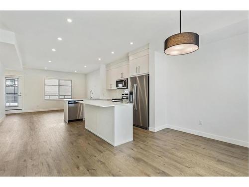 1603-280 Chelsea Road, Chestermere, AB - Indoor Photo Showing Kitchen With Stainless Steel Kitchen With Upgraded Kitchen