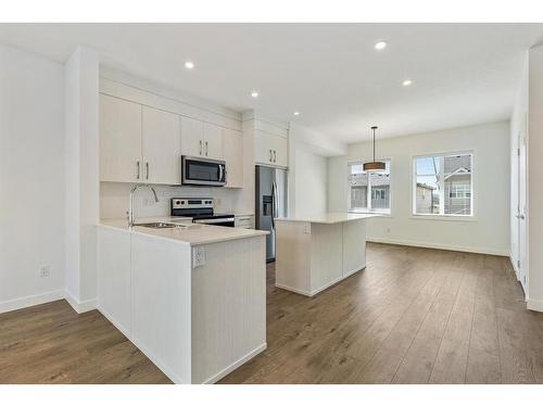 1603-280 Chelsea Road, Chestermere, AB - Indoor Photo Showing Kitchen With Stainless Steel Kitchen With Upgraded Kitchen