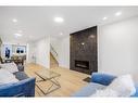 3-426 13 Avenue Ne, Calgary, AB  - Indoor Photo Showing Living Room With Fireplace 