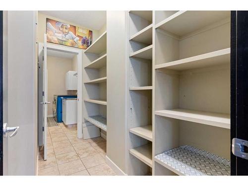 16 Sunset Close, Cochrane, AB - Indoor With Storage