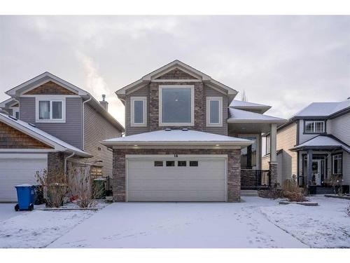 16 Sunset Close, Cochrane, AB - Outdoor With Facade