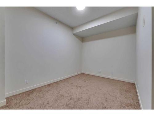 103-788 12 Avenue Sw, Calgary, AB - Indoor Photo Showing Other Room