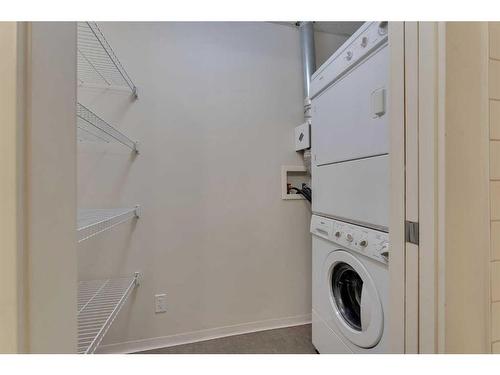 103-788 12 Avenue Sw, Calgary, AB - Indoor Photo Showing Laundry Room