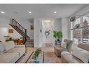 1-1922 25A Street Sw, Calgary, AB  - Indoor Photo Showing Living Room 