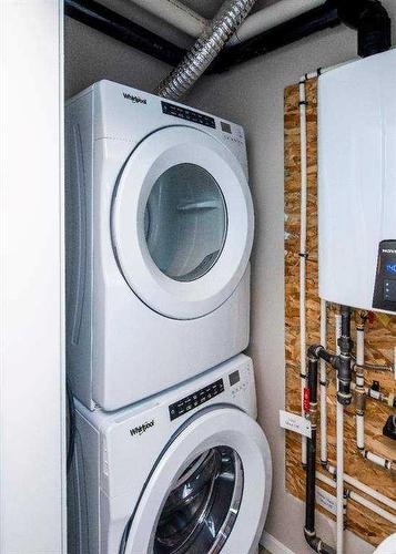 151 Redstone Drive Ne, Calgary, AB - Indoor Photo Showing Laundry Room