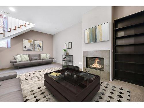 2003 27 Avenue Sw, Calgary, AB - Indoor Photo Showing Living Room With Fireplace