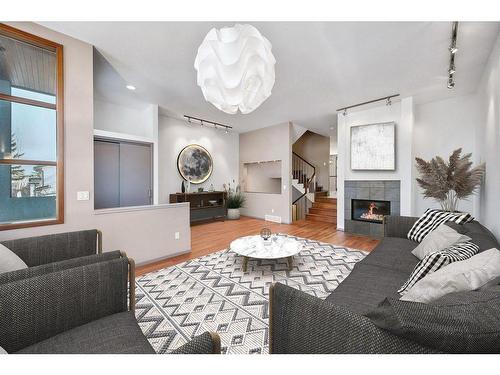 2003 27 Avenue Sw, Calgary, AB - Indoor Photo Showing Living Room With Fireplace