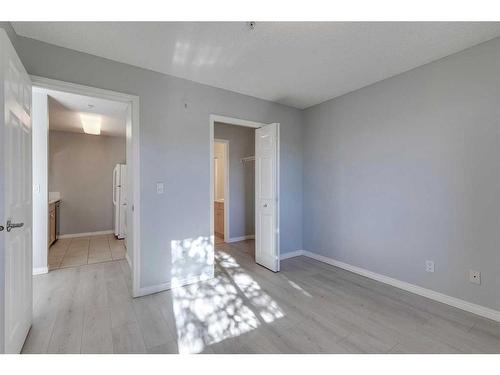 119-2022 Canyon Meadows Drive Se, Calgary, AB - Indoor Photo Showing Other Room