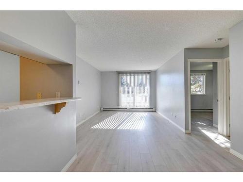 119-2022 Canyon Meadows Drive Se, Calgary, AB - Indoor Photo Showing Other Room