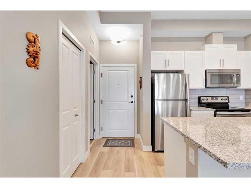 408-10 Mahogany Mews Se, Calgary, AB - Indoor Photo Showing Kitchen With Stainless Steel Kitchen