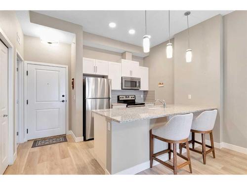 408-10 Mahogany Mews Se, Calgary, AB - Indoor Photo Showing Kitchen With Stainless Steel Kitchen With Upgraded Kitchen