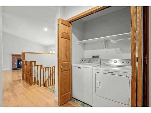 14 West Chapman Place, Cochrane, AB - Indoor Photo Showing Laundry Room