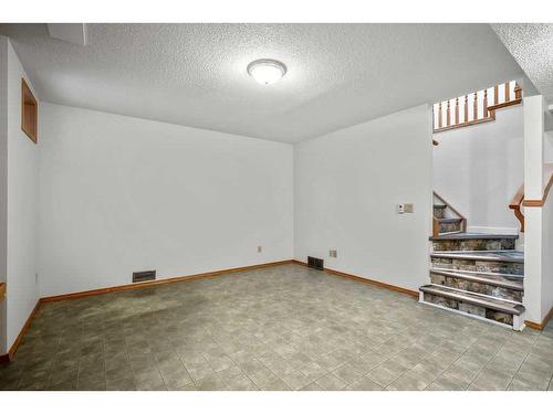 14 West Chapman Place, Cochrane, AB - Indoor Photo Showing Other Room