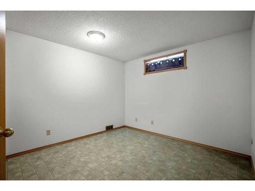 14 West Chapman Place, Cochrane, AB - Indoor Photo Showing Other Room