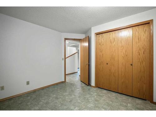 14 West Chapman Place, Cochrane, AB - Indoor Photo Showing Other Room