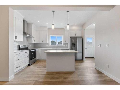 830 Bayview Terrace Sw, Airdrie, AB - Indoor Photo Showing Kitchen With Stainless Steel Kitchen With Upgraded Kitchen