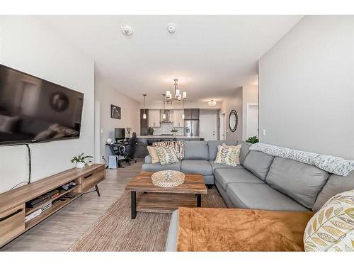 507-2231 Mahogany Boulevard Se, Calgary, AB - Indoor Photo Showing Living Room