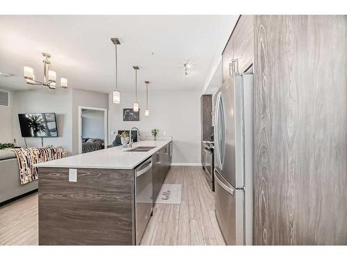 507-2231 Mahogany Boulevard Se, Calgary, AB - Indoor Photo Showing Kitchen With Upgraded Kitchen