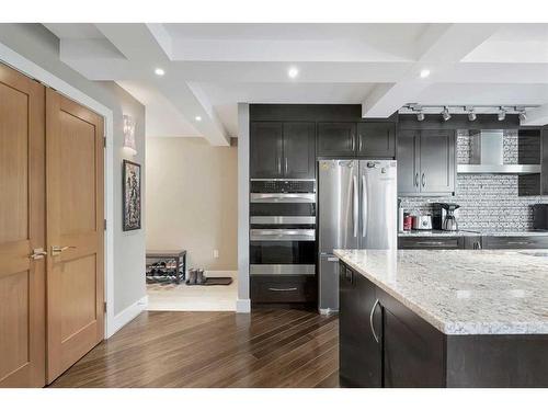 2C-133 25 Avenue Sw, Calgary, AB - Indoor Photo Showing Kitchen With Stainless Steel Kitchen With Upgraded Kitchen