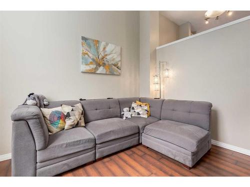 303 Toscana Gardens Nw, Calgary, AB - Indoor Photo Showing Living Room