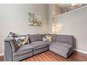 303 Toscana Gardens Nw, Calgary, AB  - Indoor Photo Showing Living Room 